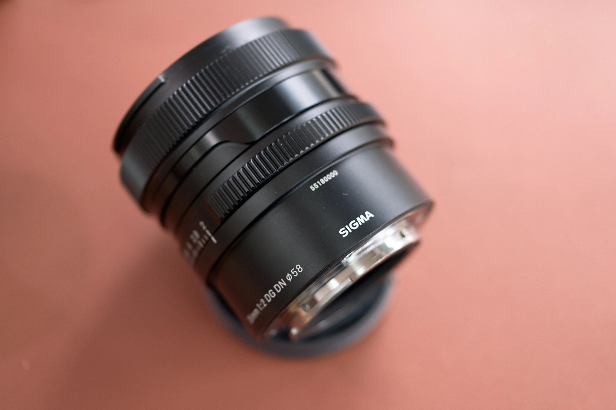 New serial number on the 35mm barrel on the lens mount side